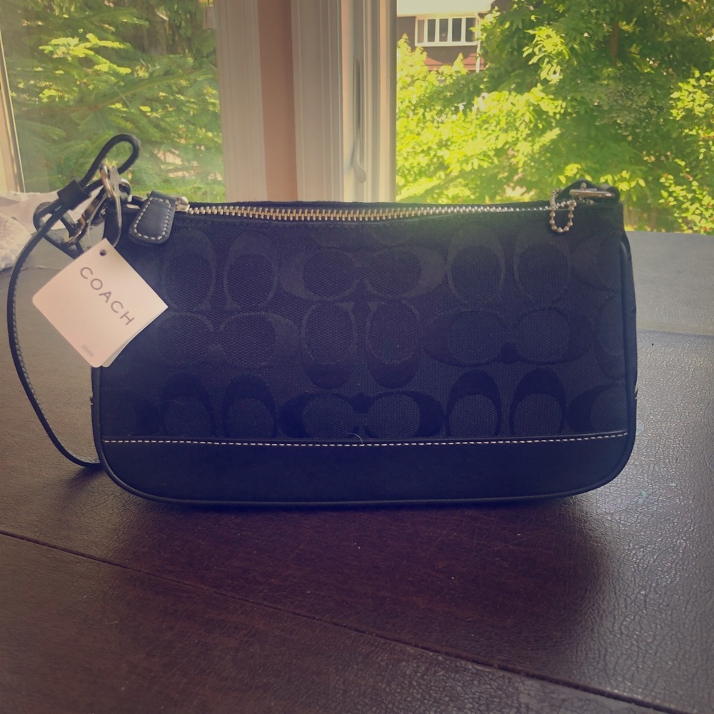 Coach clutch with removable strap